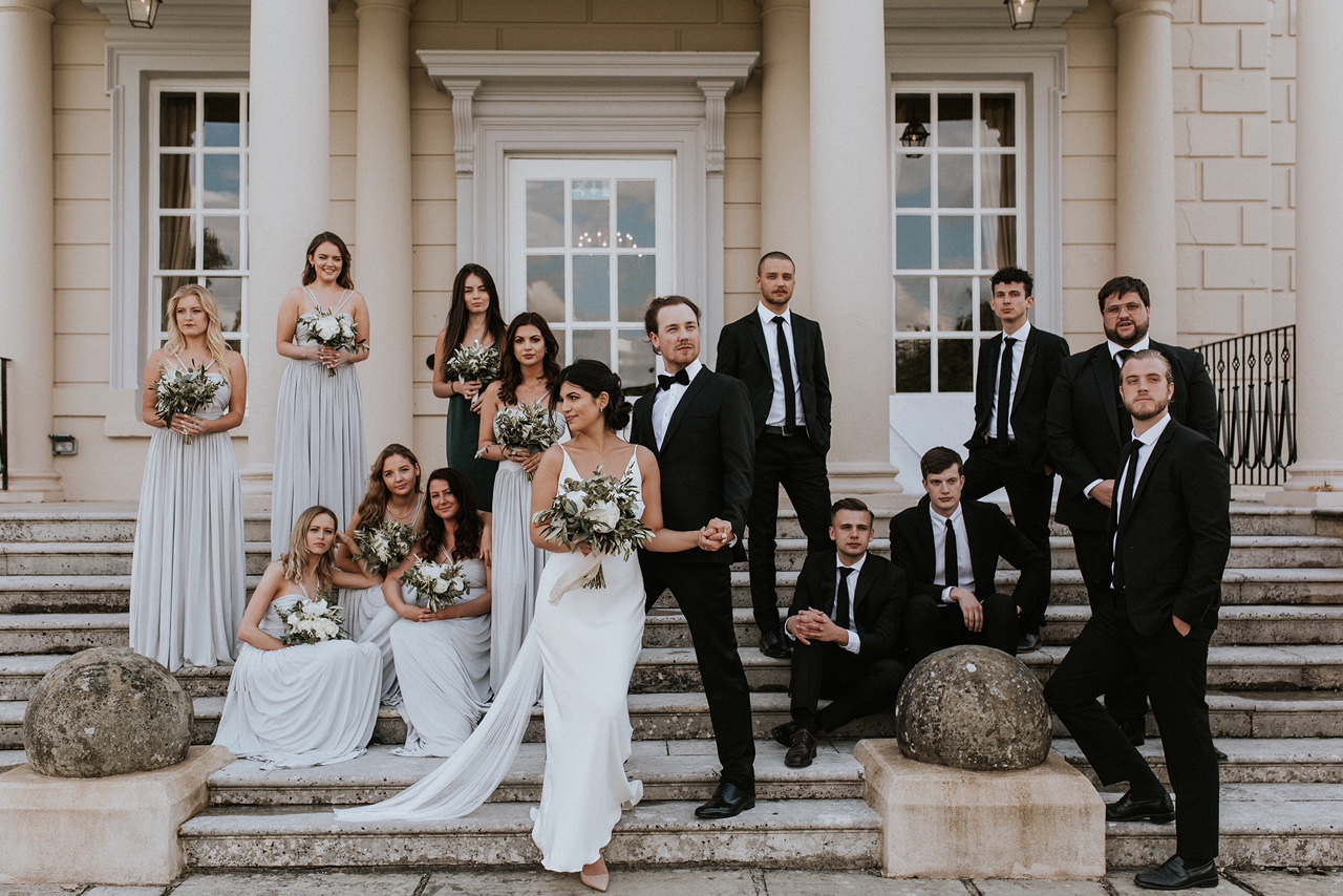 Bridal party at Buxted Park Hotel, Sussex. Photo by Nataly J Photography