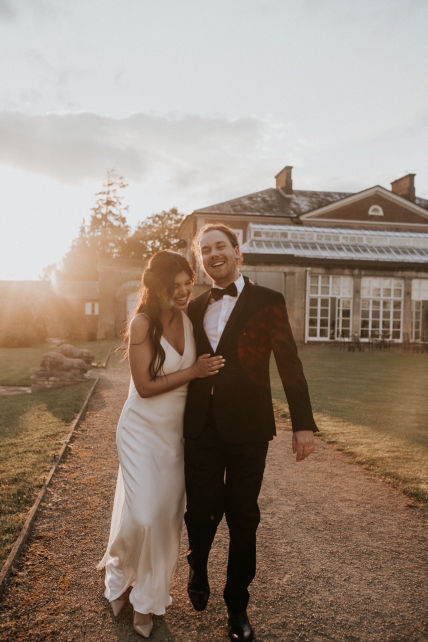 Wedding couple portrait at Buxted Park Hotel, Sussex. Photo by Nataly J Photography