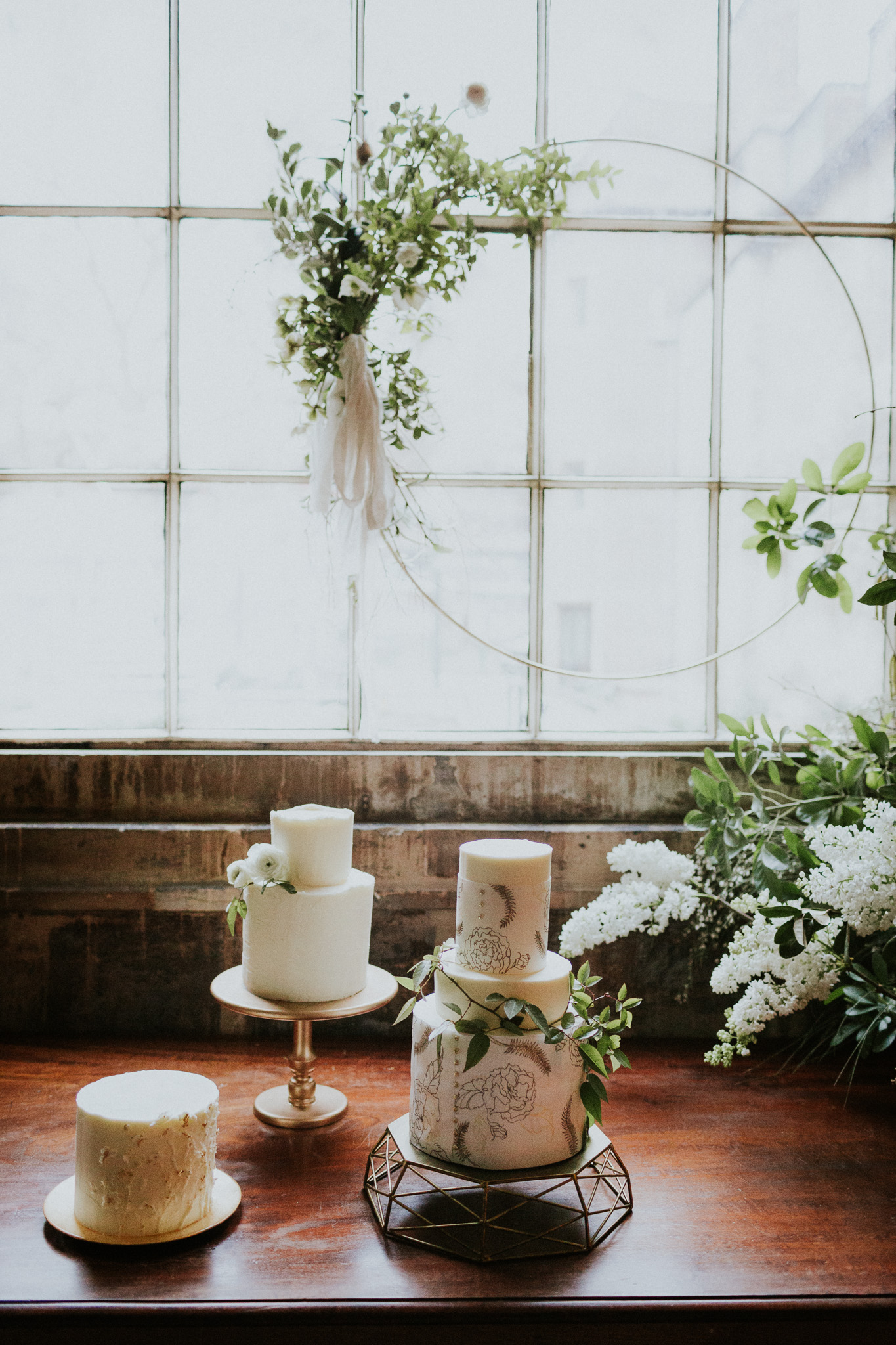 Trio of modern, botanical inspired buttercream wedding cakes for a London wedding