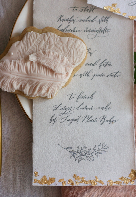 Romantic blush-coloured wedding favour biscuits