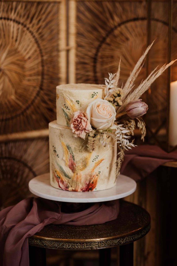 Modern Boho Buttercream Wedding Cake iwith brushstrokes of colour for a barn wedding