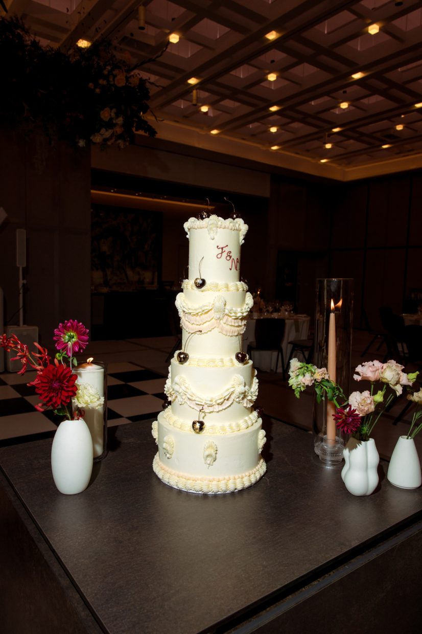 4 tier vintage buttercream wedding cake in ivory and pale peach with gold cherries | London