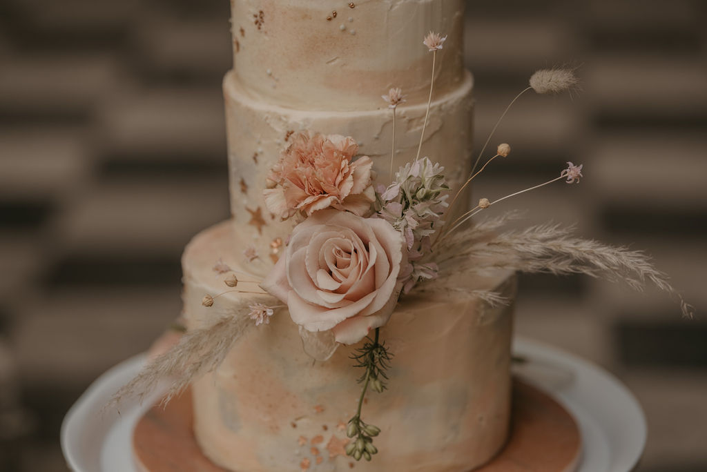 Boho buttercream wedding cake in blush, nude and caramel tones for a tropical wedding | Wotton House Hotel | Pierra G Photography