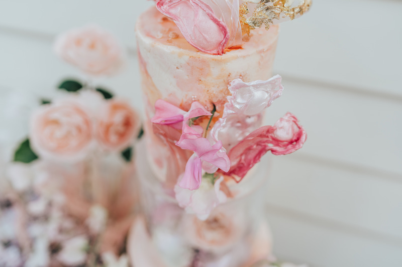 Handmade edible details on this beautiful marbled buttercream cake | Rebecca Carpenter Photography