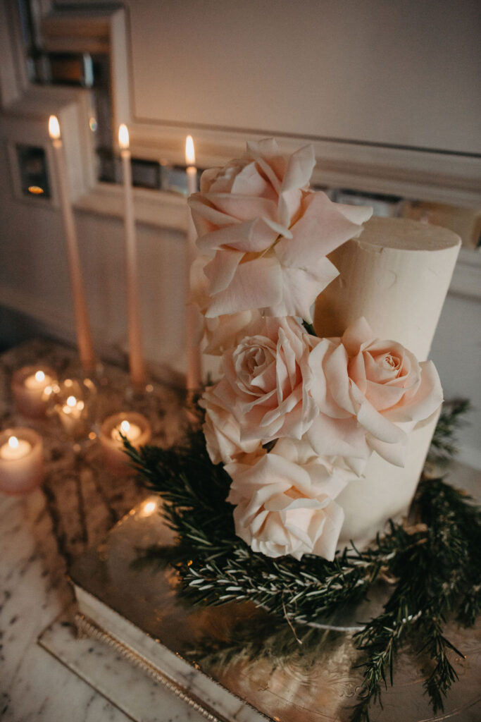 Intimate luxury winter wedding at The Langham London | 2 tier buttercream wedding cake with bold blush pink roses | Sammy Taylor photography
