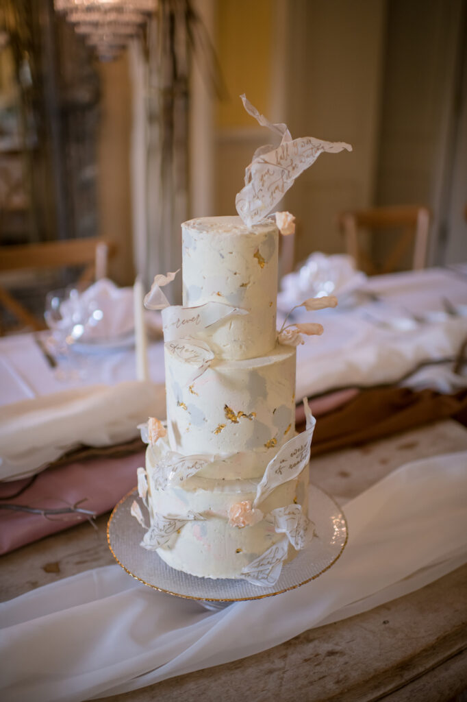 Bespoke buttercream wedding cake for Asian bride and groom at Euridge Manor with personalised hand-calligraphed details | Cotswolds