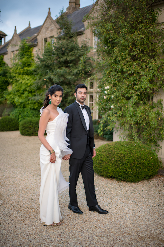 Elegant chic fashion forward look of Asian couple at Euridge Manor wedding | Cotswolds