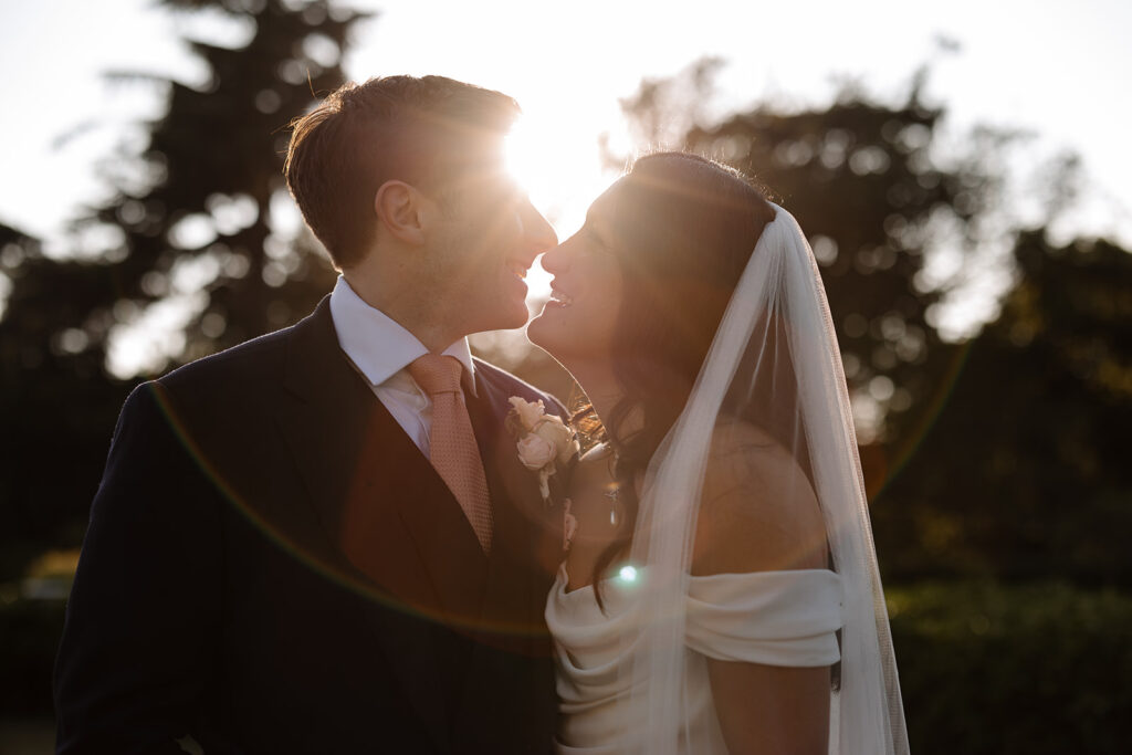 Modern stylish couple | Summer wedding at Kew Gardens with bride in Halfpenny London and groom in Dege and Skinner Saville Row