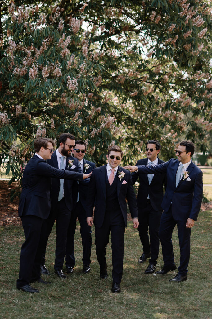 Modern stylish couple | Summer wedding at Kew Gardens with groom in Dege and Skinner Saville Row