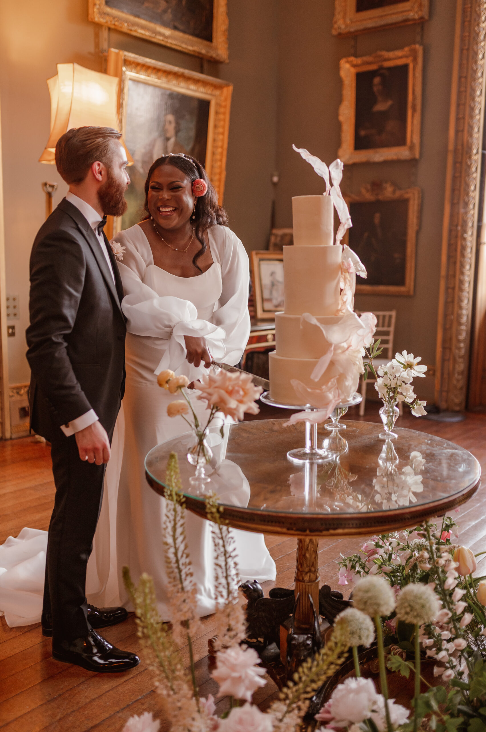 Modern beautiful wedding at Somerley House UK featured on Brides.com with 4 tier buttercream cake