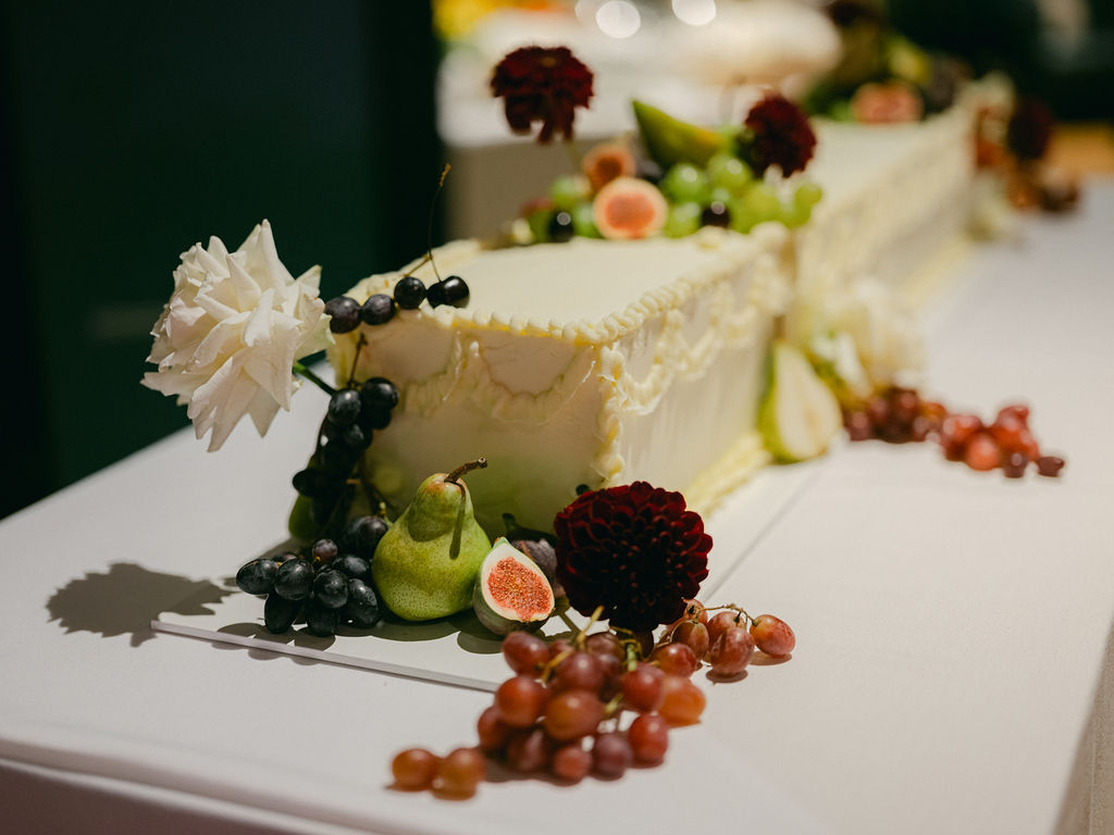 Long rectangle slab cake with autumnal fruit and flowers for Monkey Island Estate wedding